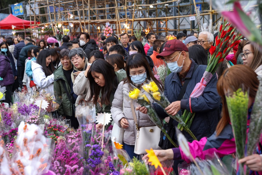 Shoppers at the Lunar New Year fair in Victoria Park, Causeway Bay, on Friday. Vendors said their sales this year were below expectations. Photo: Yik Yeung-man