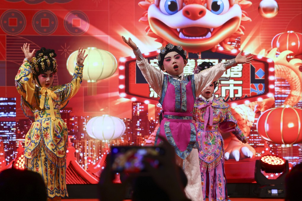 Children perform in Chinese costumes during the opening ceremony of the   government’s “Day X Night Vibes@18 Districts” campaign. Photo: Dickson Lee