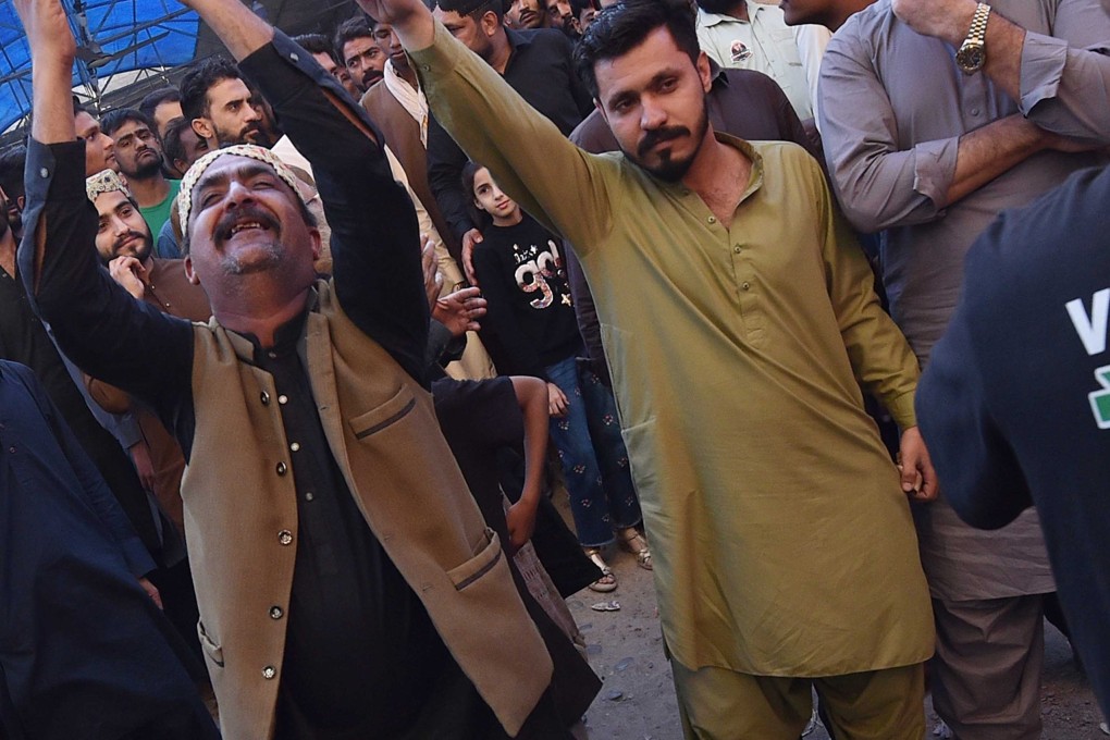 Supporters of the Pakistan Peoples Party (PPP) celebrate on Friday, the day after the country’s general election, although no clear victor has yet emerged. Photo: EPA-EFE