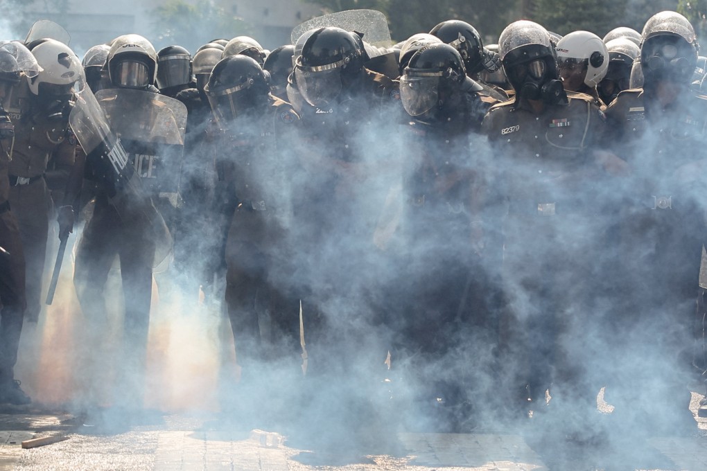Police use tear gas and water cannon to disperse demonstrators during an anti-government protest in the Sri Lankan capital Colombo on January 30. Analysts say voters have become disillusioned with the nation’s traditional ruling elite and want change. Photo: Reuters