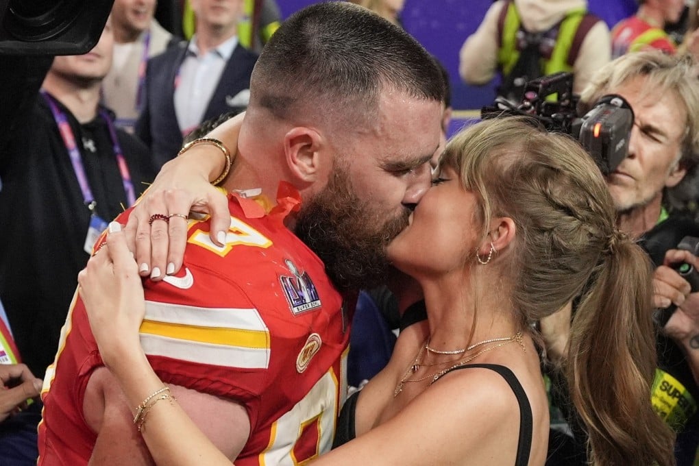 Kansas City Chiefs tight end Travis Kelce kisses Taylor Swift after Super Bowl victory. Photo: AP Photo