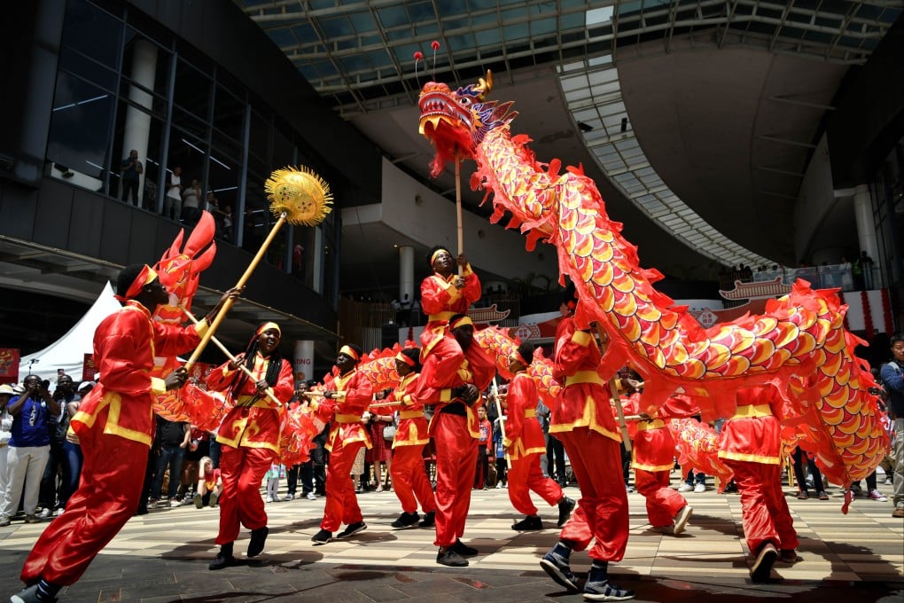 Kenyan and other performers take part in a traditional dragon dance at the Nairobi Chinese New Year Gala on Saturday. Photo: Xinhua