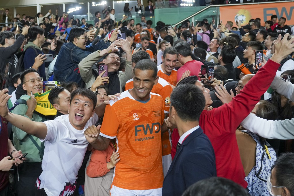 Rivaldo of the World Legends team takes pleases fans during the prize presentation at Hong Kong Stadium. Photo: Sam Tsang