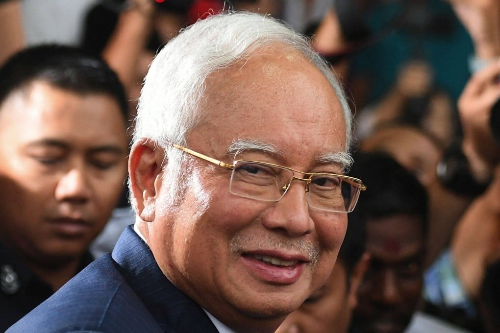 Malaysia’s former prime minister Najib Razak had his sentence for his alleged involvement in the looting of sovereign wealth fund 1MDB halved to six years. Photo: AFP