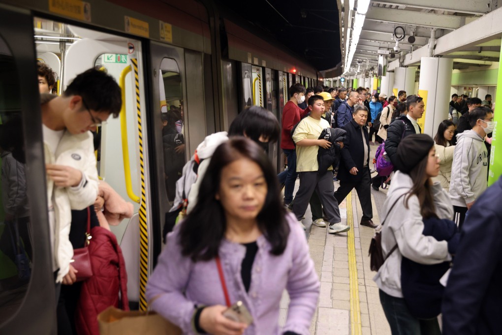 Lunar New Year travellers arriving at the Lo Wu border in Hong Kong, heading for mainland China. Photo: Yik Yeung-man