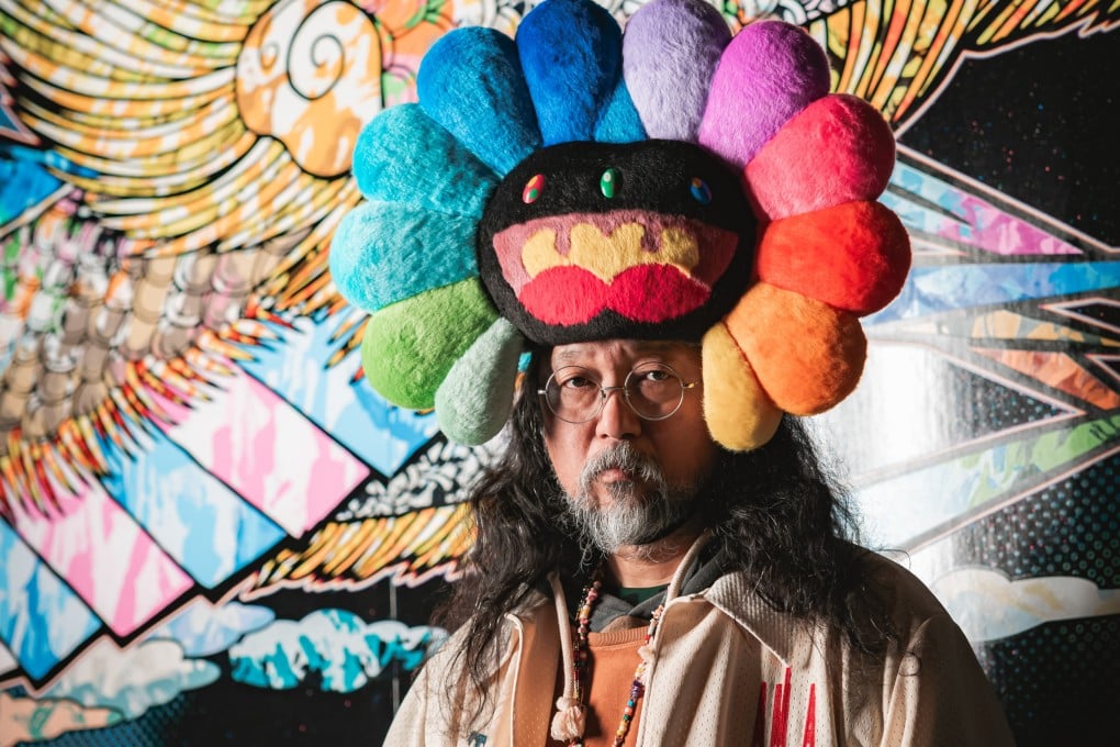Japanese contemporary artist Takashi Murakami in front of a mural at his new exhibition, “Takashi Murakami Mononoke Kyoto”, in Kyoto, Japan. Photo: Kyoto City Kyocera Museum of Art