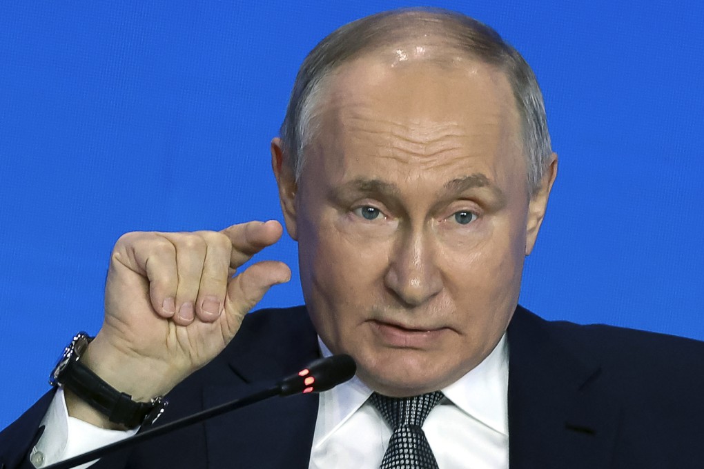 Russian President Vladimir Putin gestures as he speaks to scientists on the sidelines of the Future Technologies Forum in Moscow on Wednesday. Photo: Sputnik via AP