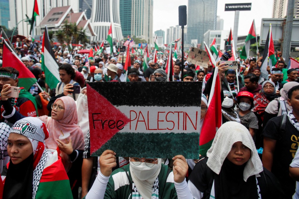 Protesters march in solidarity with Palestinians in Kuala Lumpur on October 28, 2023. Photo: Reuters