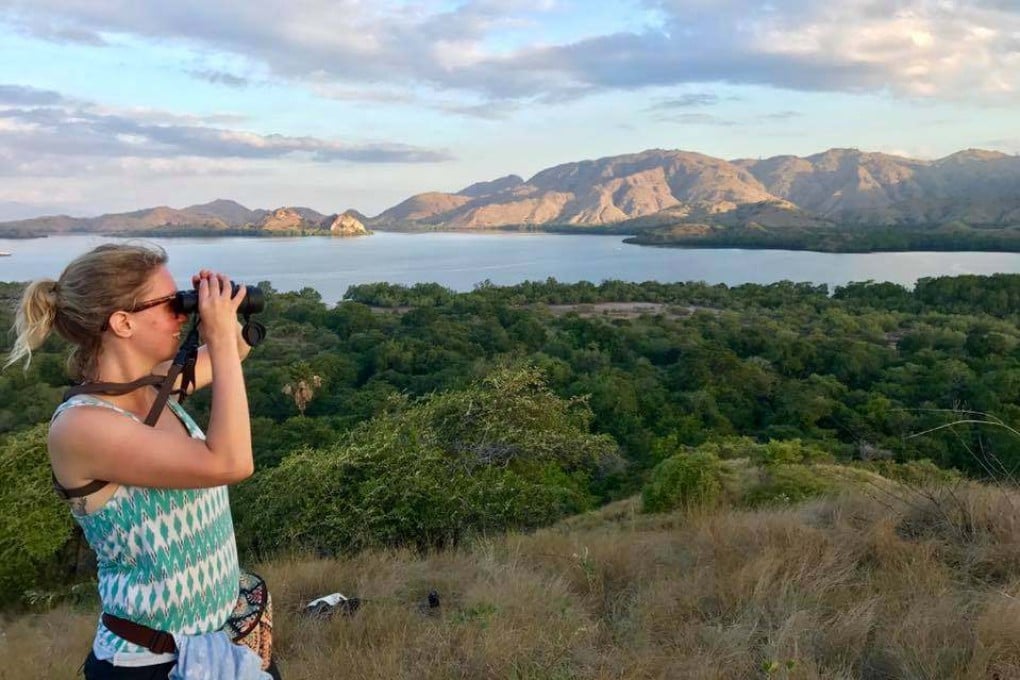 Growing up in Hong Kong, Astrid Andersson developed a passion for its wildlife and nature. She channelled that into research on the wildlife trade, and is pictured above searching for cockatoos in Komodo National Park, Indonesia. Photo: Astrid Andersson