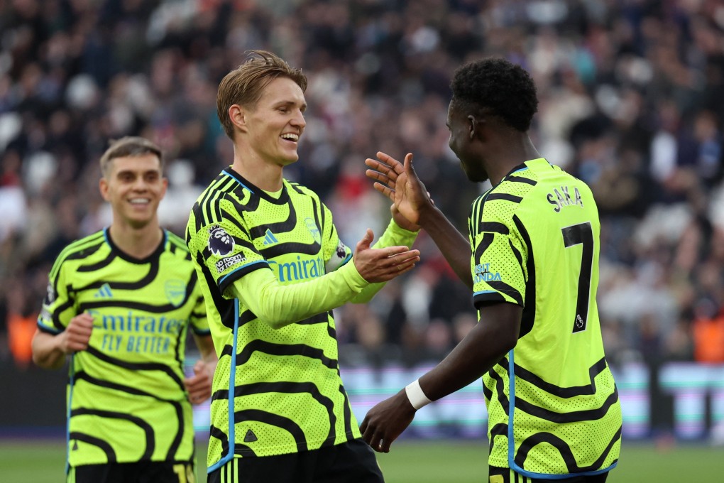 Arsenal legend Robert Pires believes Martin Odegaard (left) and Bukayo Saka can inspire Arsenal to Premier League glory. Photo: Reuters