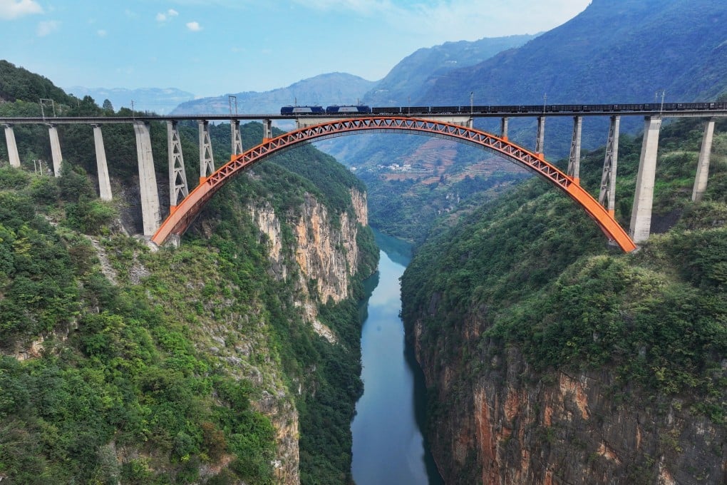 In November 2023, a freight train crosses a bridge near Liupanshui, Guizhou province, southwest China, on the Liupanshui-Hongguo Railway. Photographer Wang Lu, who captured the image using a drone-mounted camera, spends up to five months a year shooting along the country’s rail network. Photo: Wang Lu