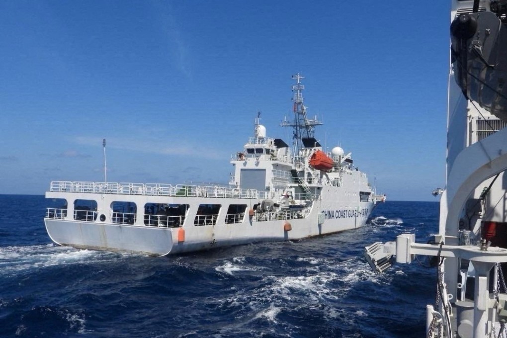 A China Coast Guard vessel manoeuvres near Philippine Coast Guard vessel BRP Teresa Magbanua near the Scarborough Shoal on February 8. Photo: PCG via Reuters