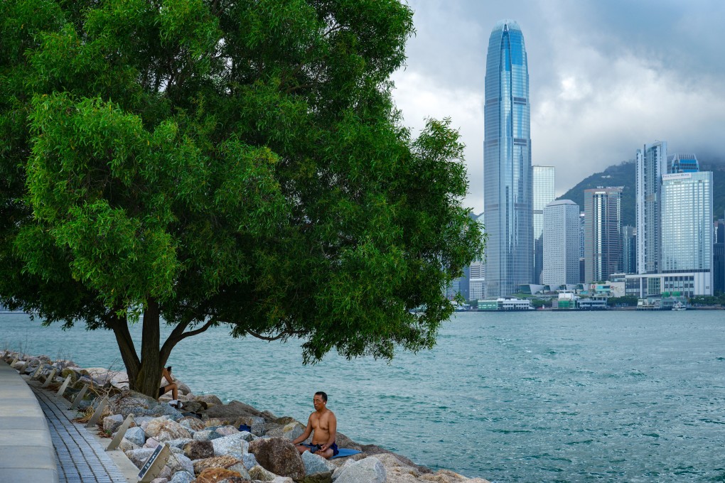 A man meditates at the West Kowloon Cultural District waterfront. Photo: Sam Tsang