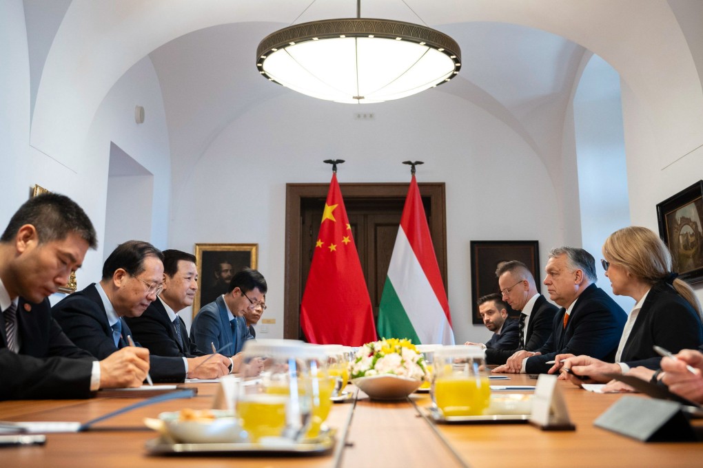 Chinese Public Security Minister Wang Xiaohong (third from left) meets Hungarian Prime Minister Viktor Orban (third from right) at the government headquarters in Budapest, Hungary, on Friday. Photo: EPA-EFE/Hungarian PM’s Press Office