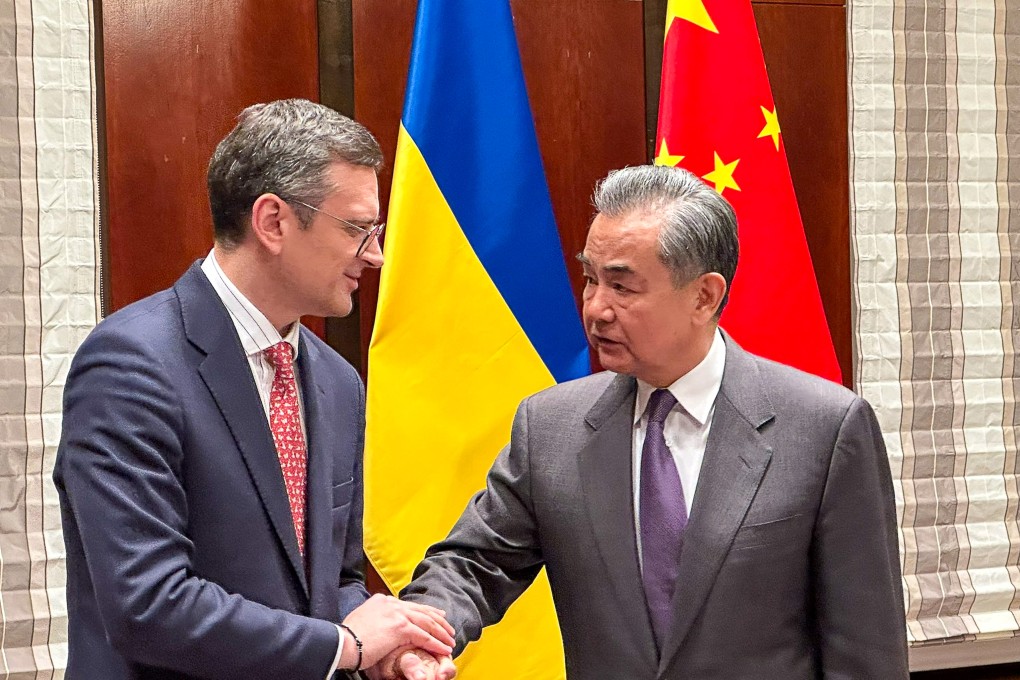 Chinese Foreign Minister Wang Yi (right) meets his Ukrainian counterpart Dmytro Kuleba in Munich on Saturday. Photo: X/ @DmytroKuleba