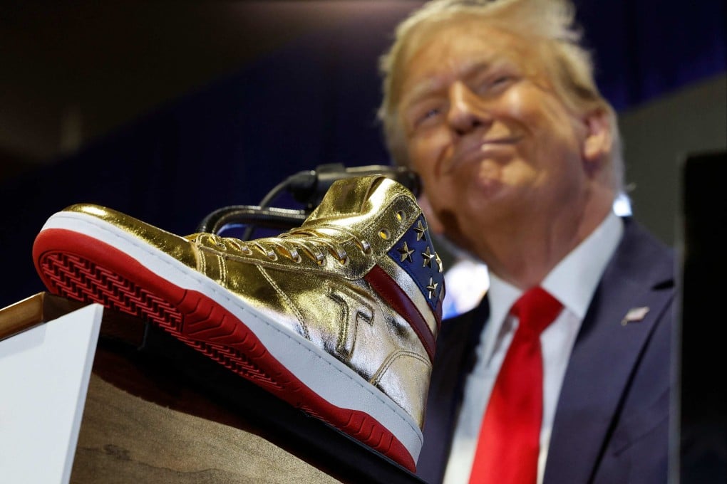 Republican presidential candidate Donald Trump introduces a new line of signature shoes on Saturday. Photo: Getty Images via AFP
