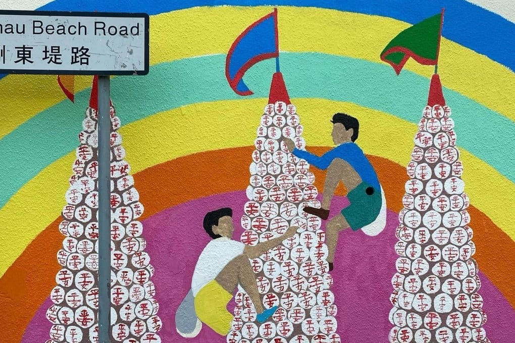 A mural on Cheung Chau island depicting the bun festival when people climb tall bamboo towers covered with buns. Photo: Handout