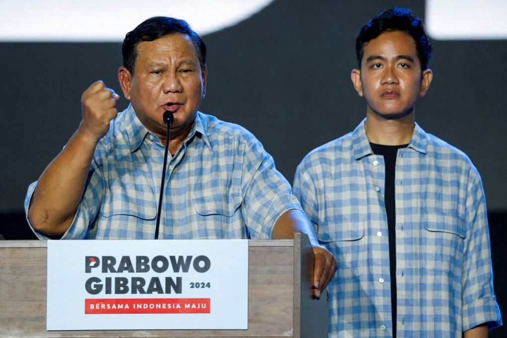 Indonesia’s President-elect Prabowo Subianto giving a speech as his running mate Gibran Rakabuming Raka, the eldest son of Indonesian President Joko Widodo, looks on. Photo: Reuters