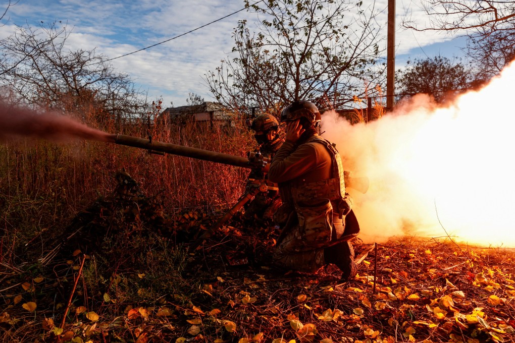 Members of Ukraine’s National Guard Omega Special Purpose fire a SPG-9 anti-tank grenade launcher toward Russian troops in the town of Avdiivka on November 8, 2023, amid Russia’s attack on Ukraine. Photo: Reuters