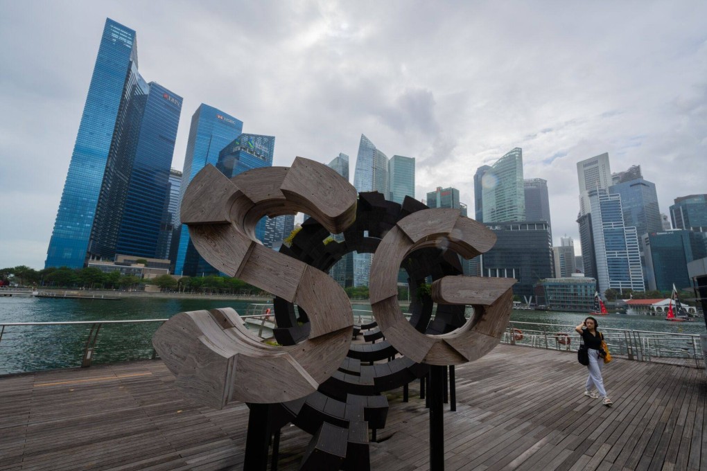 Buildings in the central business district of Singapore. The city state’s dollar recently hit record highs against Malaysia’s ringgit. Photo: Bloomberg