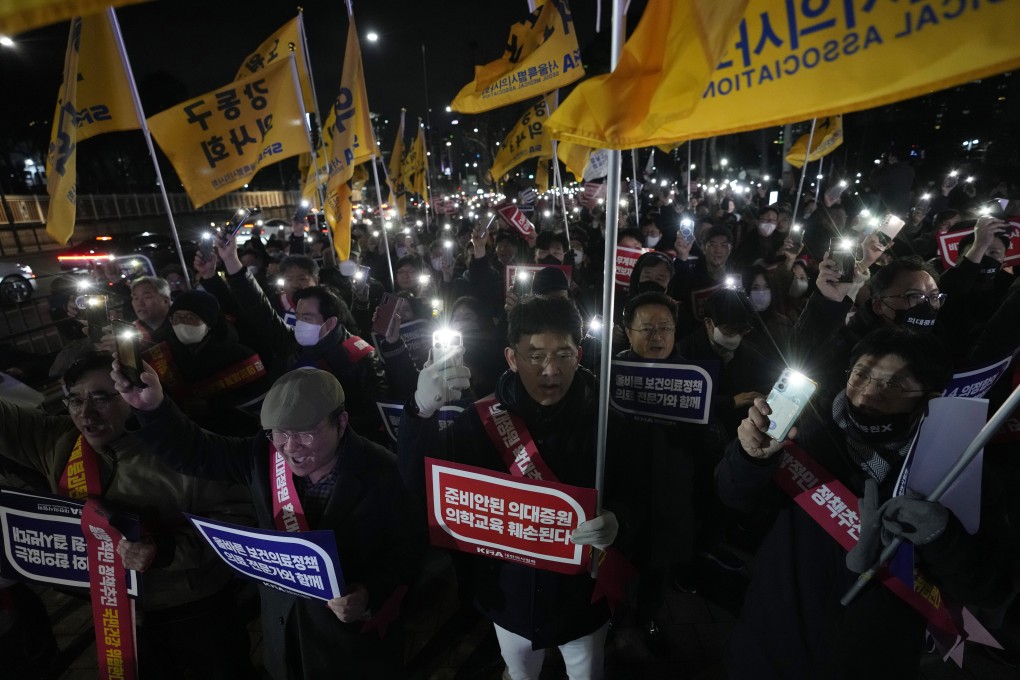Doctors rally against the government’s medical policy near the presidential office in Seoul last Thursday. Photo: AP