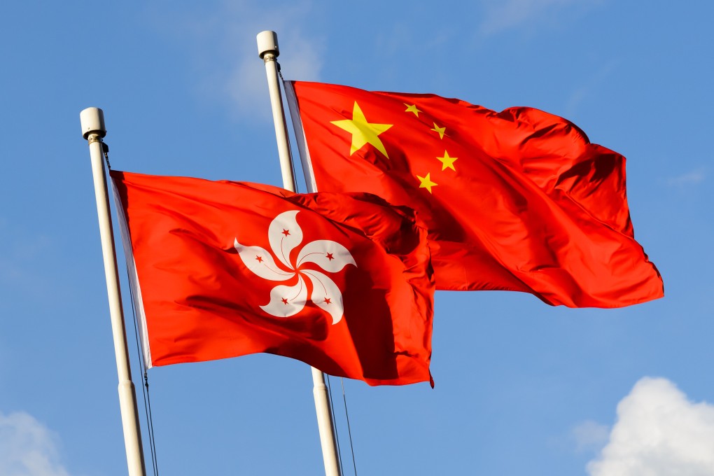 China and Hong Kong flags. Top Beijing official Xia Baolong will begin his six-day trip to Hong Kong on Thursday. Photo: Shutterstock