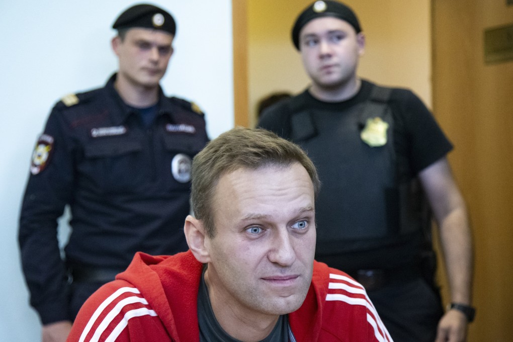 Russian opposition leader Alexei Navalny speaks to the media prior to a court session in Moscow on August 22, 2019. Photo: AP