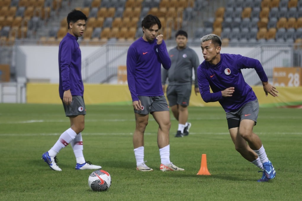 Li Ngai-hoi (right) believes he can better compete for a place in the Hong Kong team by staying in the city. Phoot: Jonathan Wong