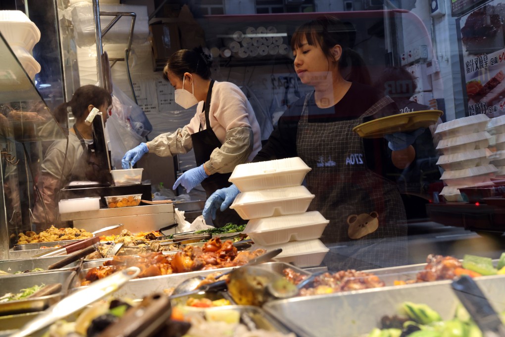 Restaurant staff use styrofoam boxes to pack takeaway food in Yau Ma Tei on January 29. Photo: Jelly Tse