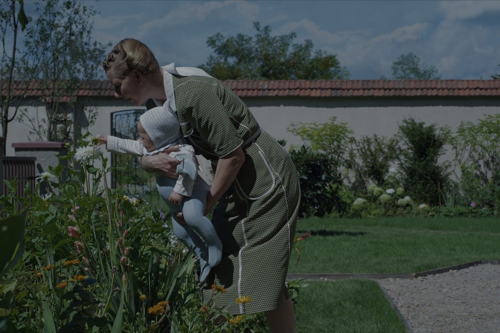 Sandra Hüller in a still from The Zone of Interest (category IIA; German, Polish), directed by Jonathan Glazer. Christian Friedel co-stars.