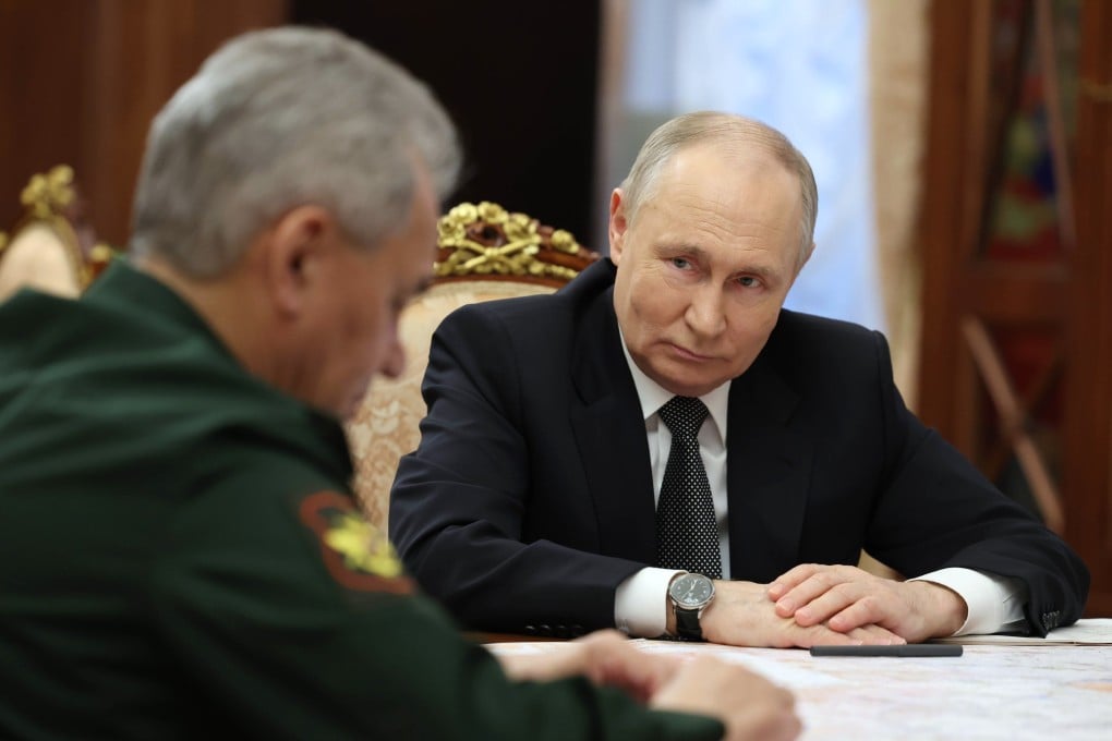 Russian President Vladimir Putin (right) listens to Russian Defence Minister Sergei Shoigu during a meeting at Kremlin on Tuesday. Photo: Sputnik via EPA-EFE