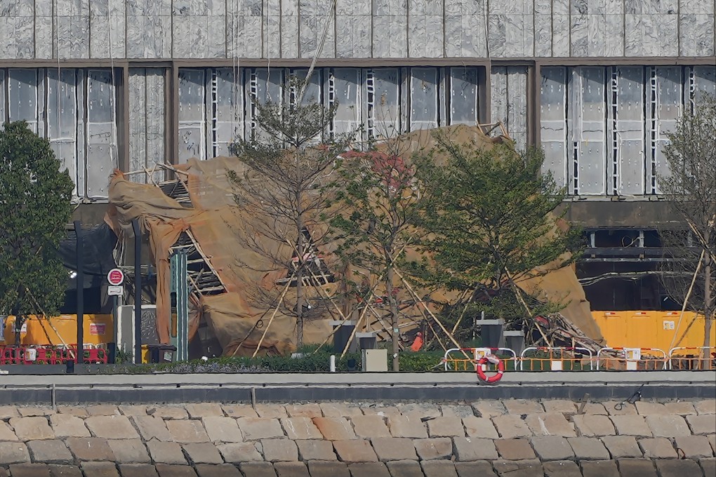Bamboo scaffolding on a building at the city’s former airport runway collapsed, killing two workers and injuring three others. Photo: Sam Tsang
