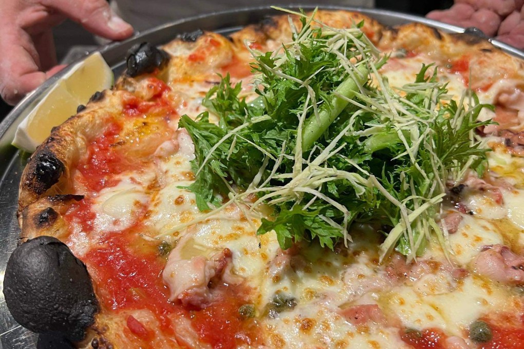 Hokkaido octopus and Shizuoka wasabi pizza from Pizza Studio Tamaki, in Tokyo, Japan. Photo: Instagram / @pizzastudiotamaki