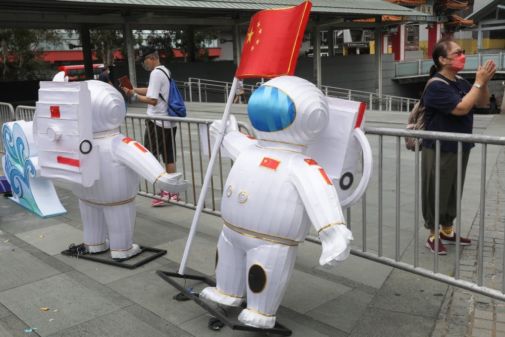 Chinese astronaut decorations are seen outside Wong Tai Sin Temple in Hong Kong on September 6, 2022. Photo: Yik Yeung-man