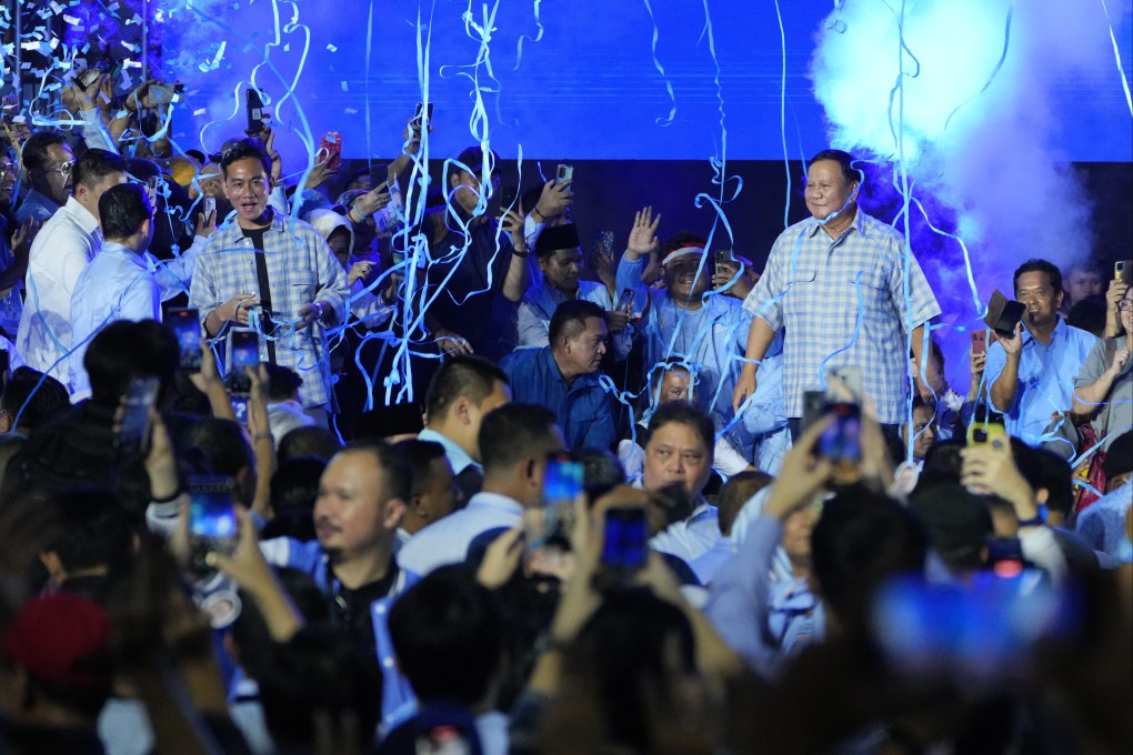 Presidential candidate Prabowo Subianto, right, celebrates with his running mate Gibran Rakabuming Raka on February 14, 2024. Photo: AP