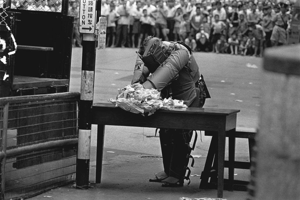 A bomb disposal officer works to clear a street of suspected explosives during the 1967 riots. The 2019 unrest pales into insignificance compared to the Japanese occupation and the 1967 riots, which Hong Kong recovered from. Photo: SCMP