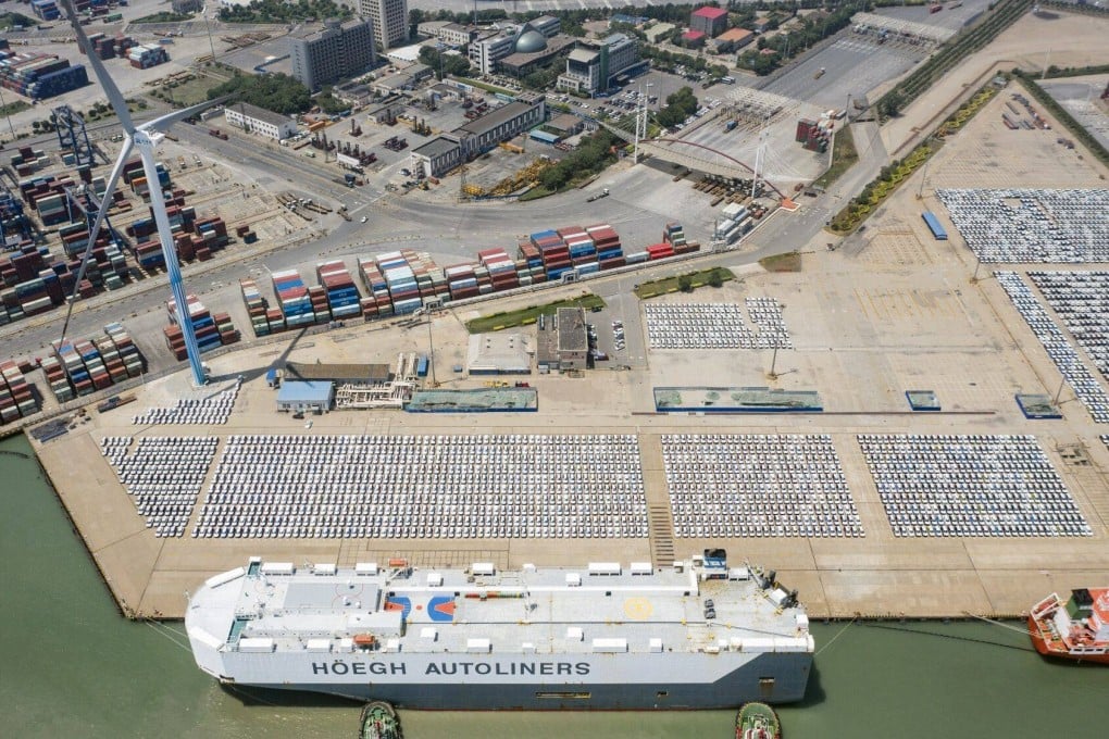 Vehicles at a yard near Tianjin port in China on June 30. China rolled out a number of measures to open up its free-trade zones as state leaders go on a charm offensive to woo foreign investors. Photo: Bloomberg