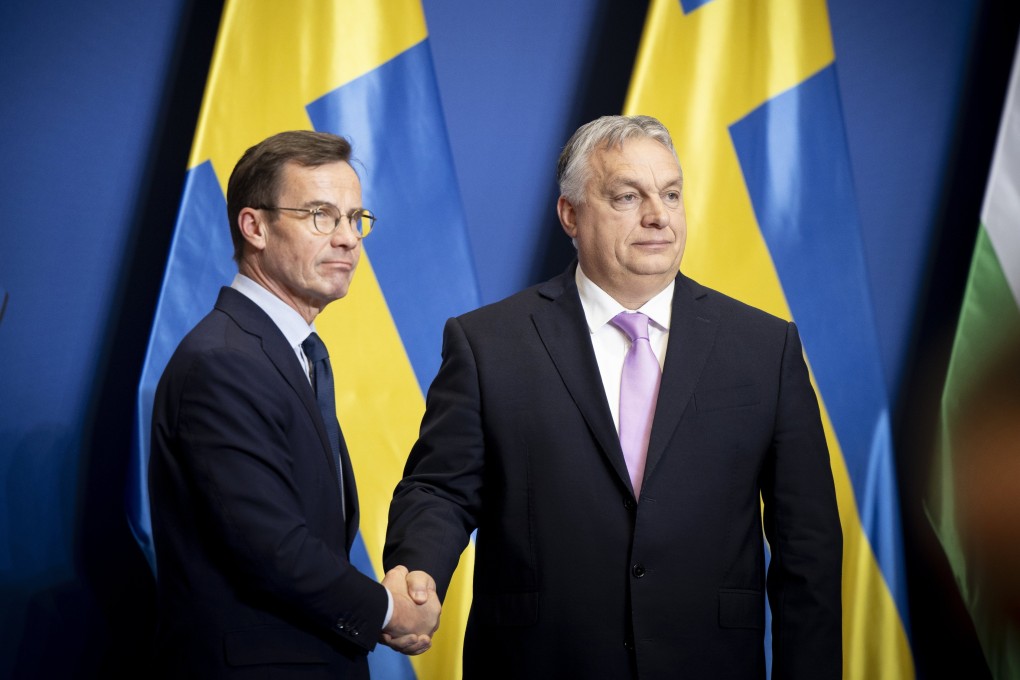 Hungarian Prime Minister Viktor Orban (right) and Swedish Prime Minister Ulf Kristersson shake hands during a press conference in Budapest on Friday. Photo: EPA-EFE