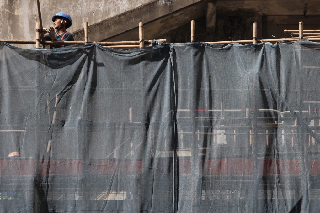 A construction worker at work in Fortress Hill on 21 February, 2024. Photo: Xiaomei Chen