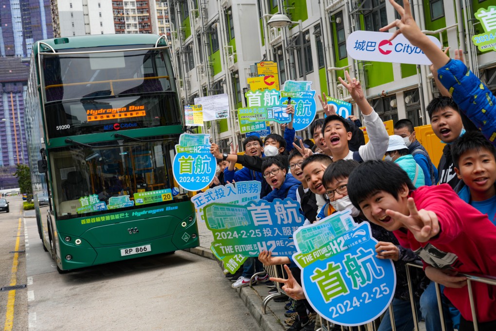Bus fans welcome Citybus’s first hydrogen-powered vehicle into service on Sunday. Photo: Sam Tsang