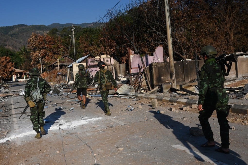 Karenni Nationalities Defence Force fighters on patrol after attacking a junta base in Shadaw town, Karreni State. Photo: Khu Sam