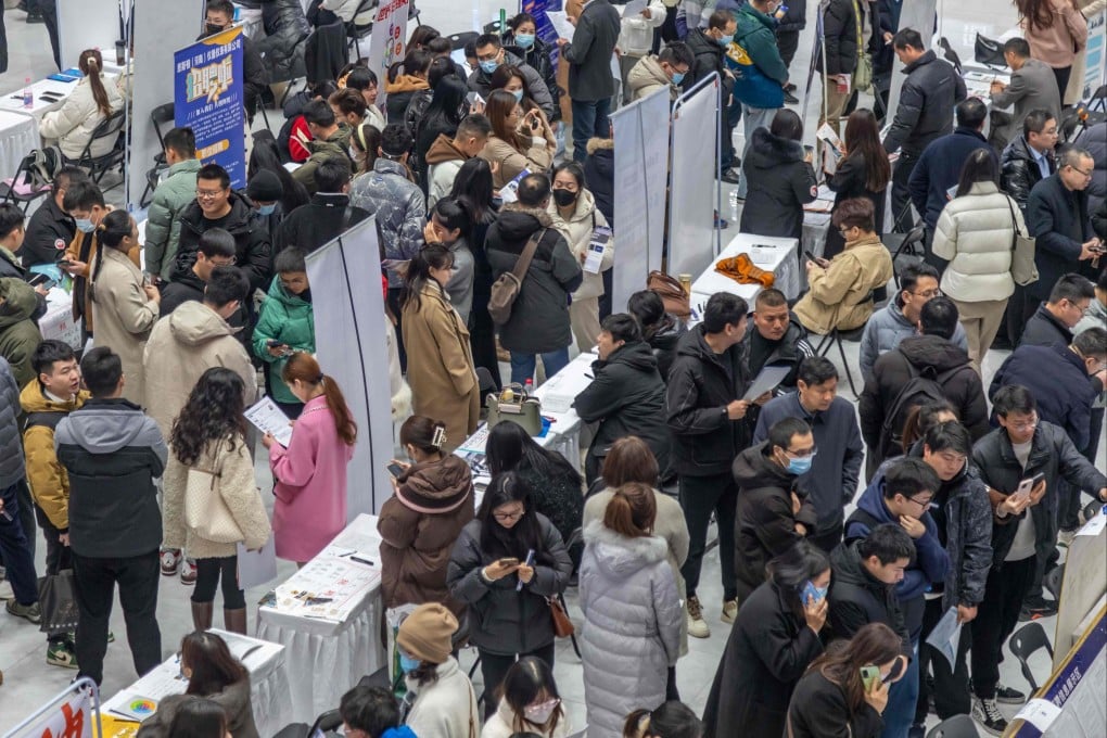 People attend a job fair in Zhengzhou, in central China’s Henan province. Photo: AFP