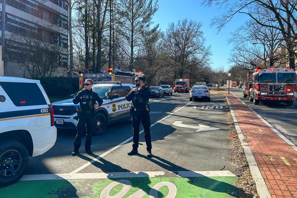 Members of the US Secret Service block access to a street leading to the Israeli embassy in Washington. Photo: AFP