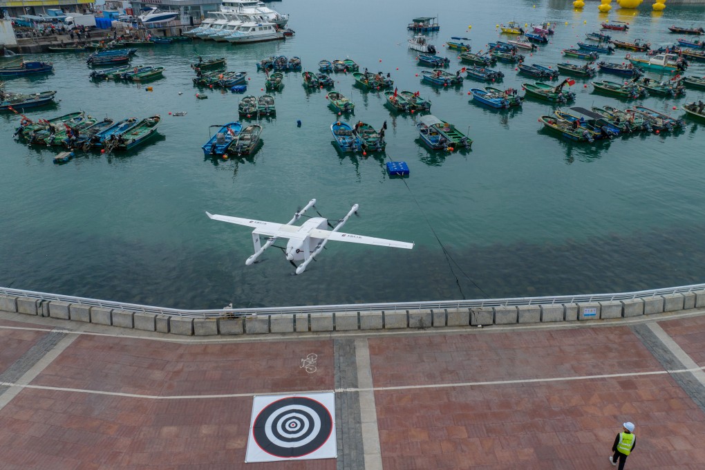 A drone carrying seafood takes off from Nan’ao Shuangyong Pier in Shenzhen on February 5 on an established delivery route to Longgang district. It would be sad if Hong Kong’s lack of low-altitude economic policies and supporting facilities cause drone deliveries and flying taxis to stop at the Shenzhen river border. Photo: Xinhua