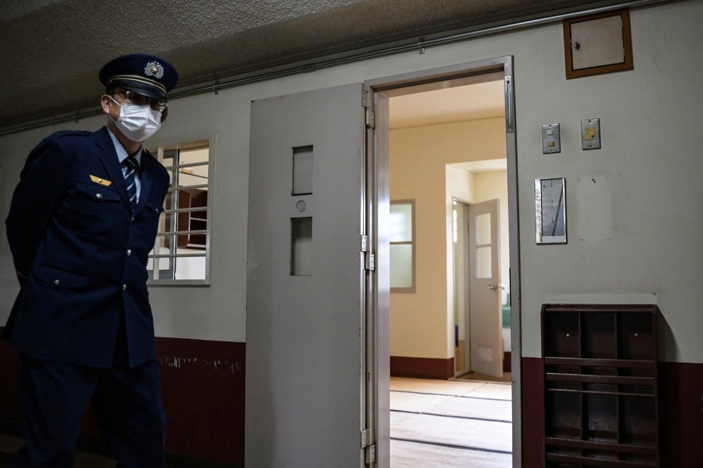 A correctional officer at Fuchu Prison during a media tour on February 22. Photo: AFP