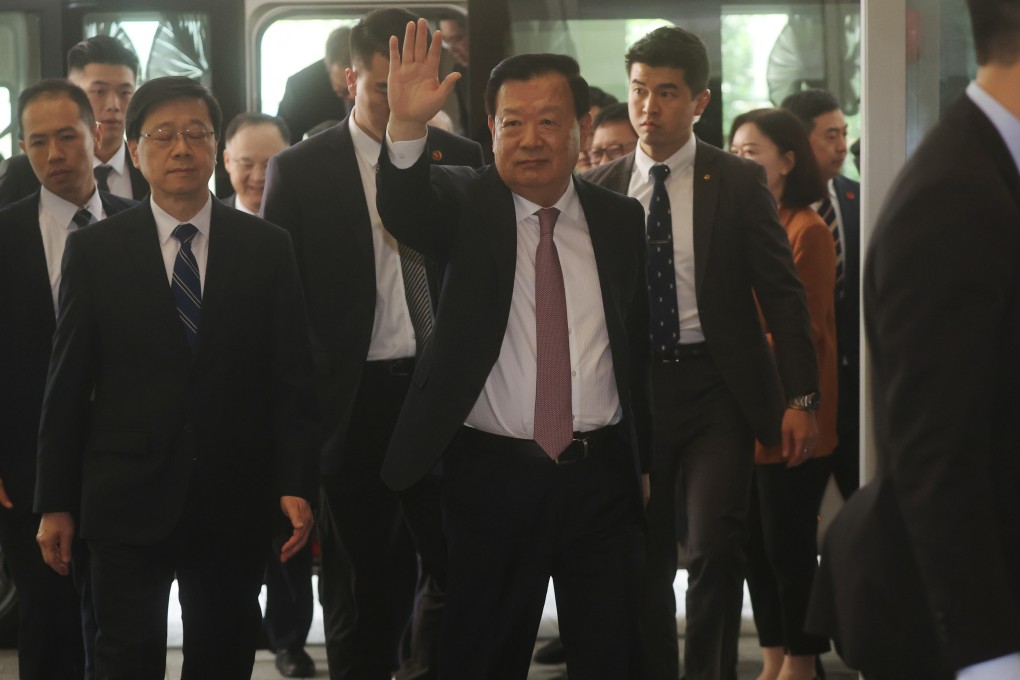 Xia Baolong (centre), director of Hong Kong and Macao Affairs Office, and city leader John Lee Ka-chiu (second left) during fourth day of his Hong Kong visit. Photo: Edmond So