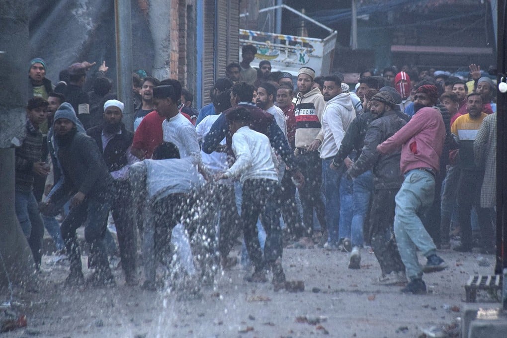 Demonstrators throw stones towards police during a protest against a government demolition drive in Haldwani, in the northern Indian state of Uttarakhand, on February 8. Photo: Reuters