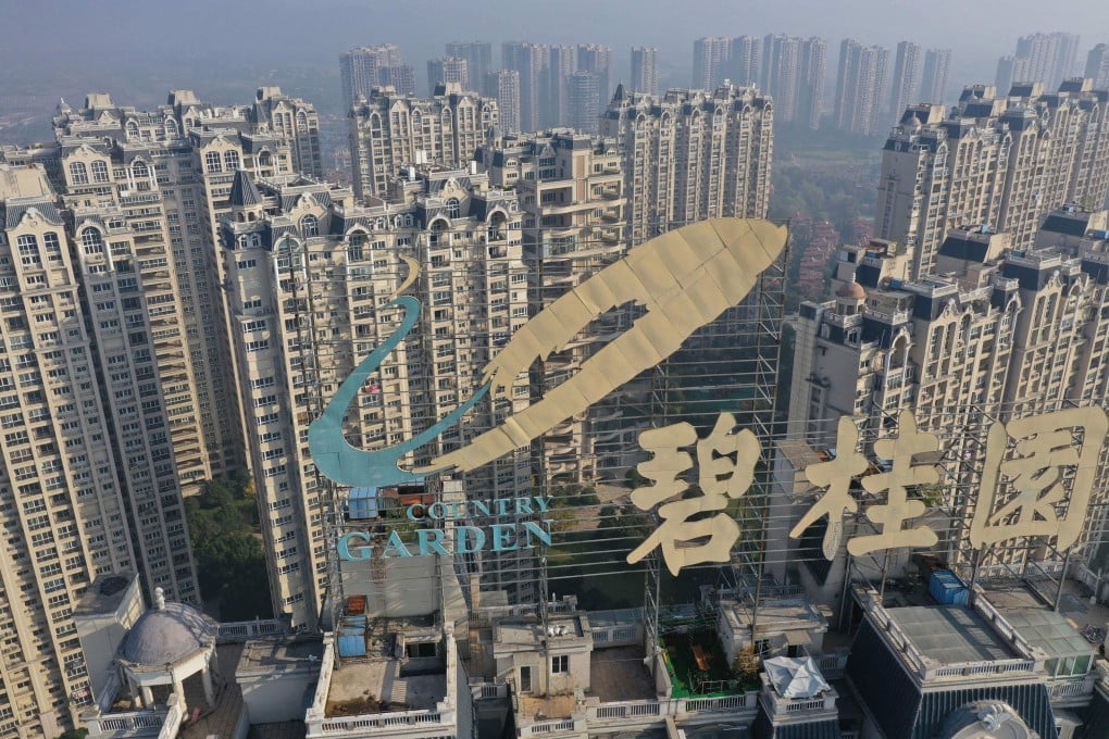 An aerial photo shows a logo of Chinese developer Country Garden Holdings on top of a building in Zhenjiang, in China’s eastern Jiangsu province. Photo: AFP