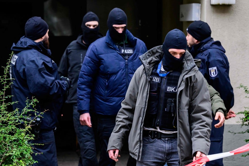 An officer of the German Federal Criminal Police Office leaves a building where Red Army Faction member Daniela Klette is thought to have been arrested on Tuesday. Photo: AFP