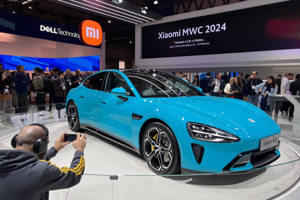 Xiaomi displays its first electric vehicle, the SU7, at trade show MWC Barcelona in Spain on February 27, 2024. Photo: Iris Deng